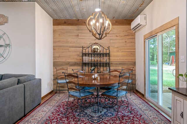 1829 Lobelville Hwy, Linden, TN 37096 - dining area featuring a wall unit AC, wood walls, a chandelier, wood finished floors, and wood ceiling
