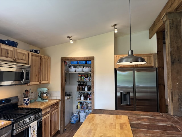1829 Lobelville Hwy, Linden, TN 37096 - kitchen featuring appliances with stainless steel finishes, butcher block counters, and wood finished floors