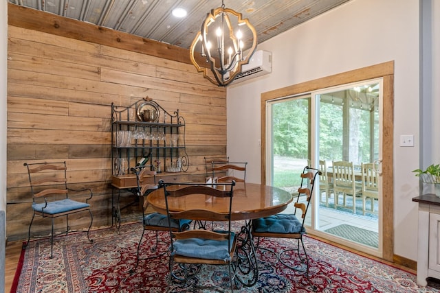 1829 Lobelville Hwy, Linden, TN 37096 - dining area with wood walls, a chandelier, a wall unit AC, wood finished floors, and wood ceiling