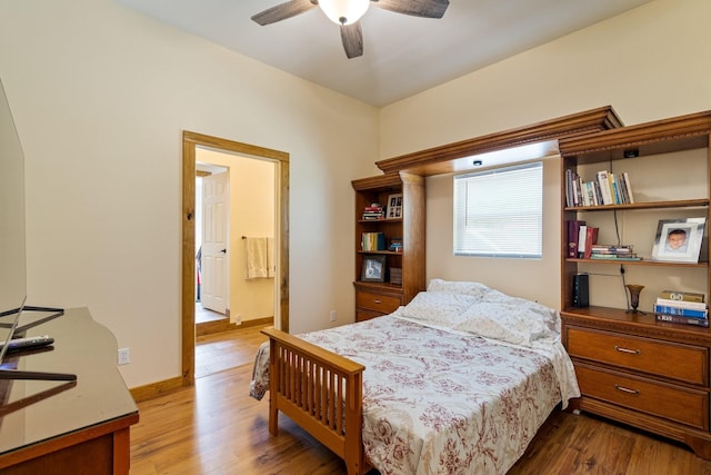 1829 Lobelville Hwy, Linden, TN 37096 - bedroom featuring wood finished floors, a ceiling fan, and ensuite bath