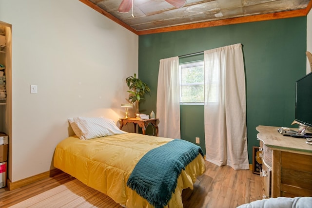 1829 Lobelville Hwy, Linden, TN 37096 - bedroom featuring light wood finished floors, crown molding, and ceiling fan
