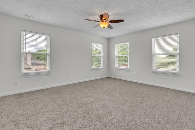3471 Esquire Dr, Murfreesboro, TN 37130 - empty room featuring a textured ceiling, baseboards, carpet flooring, and ceiling fan
