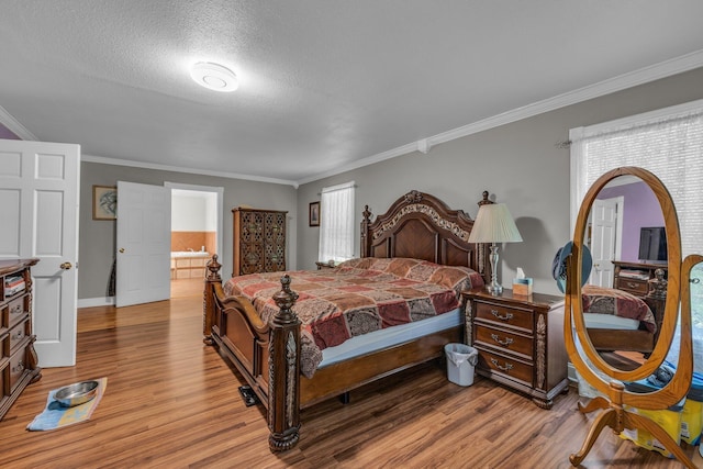 1151 Baker And Hearn Cir, Chickamauga, GA 30707 - bedroom with light wood-style floors, crown molding, baseboards, multiple windows, and a textured ceiling