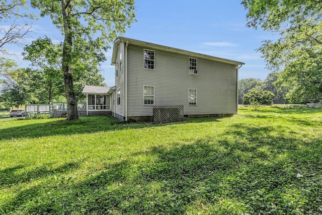 1151 Baker And Hearn Cir, Chickamauga, GA 30707 - rear view of property featuring a lawn, crawl space, and a sunroom