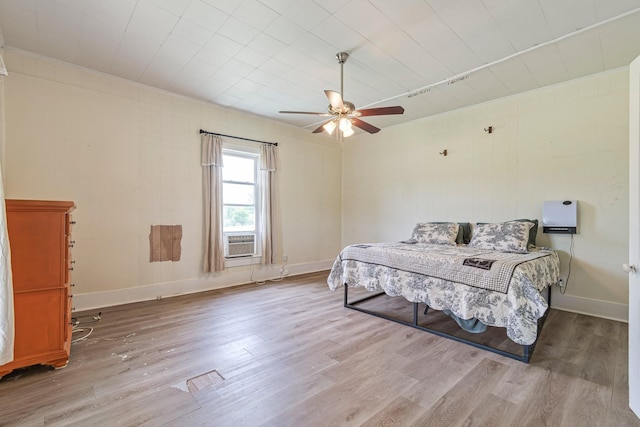 1672 Globe Rd, Lewisburg, TN 37091 - bedroom featuring wood finished floors, cooling unit, baseboards, and ceiling fan