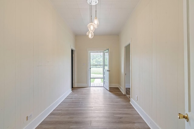 1672 Globe Rd, Lewisburg, TN 37091 - hallway featuring wood finished floors, baseboards, and wooden walls