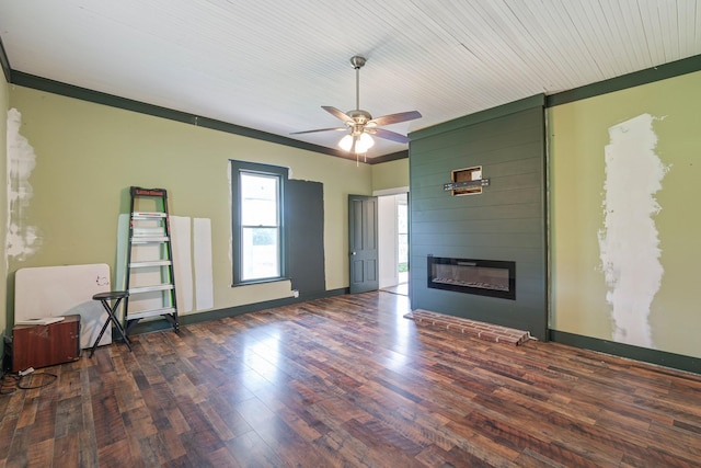 1672 Globe Rd, Lewisburg, TN 37091 - unfurnished living room featuring wood finished floors, a ceiling fan, a fireplace, baseboards, and ornamental molding