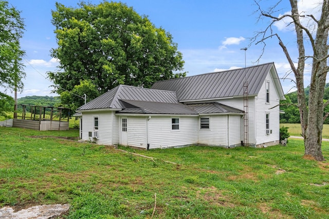 1672 Globe Rd, Lewisburg, TN 37091 - rear view of property featuring a lawn and metal roof