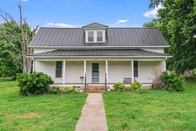 1672 Globe Rd, Lewisburg, TN 37091 - view of front of house featuring a front lawn, a porch, and metal roof