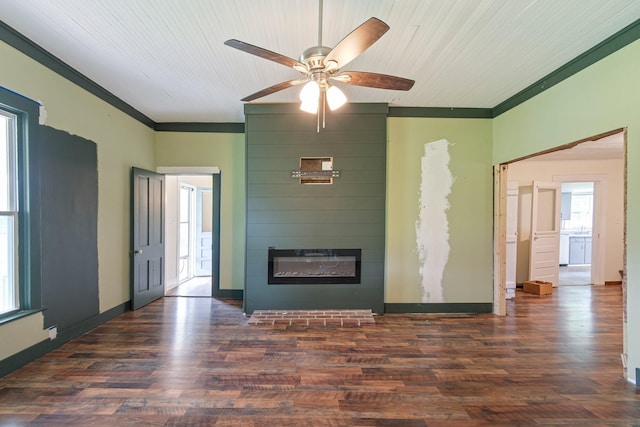 1672 Globe Rd, Lewisburg, TN 37091 - unfurnished living room featuring wood finished floors, plenty of natural light, ceiling fan, a fireplace, and crown molding