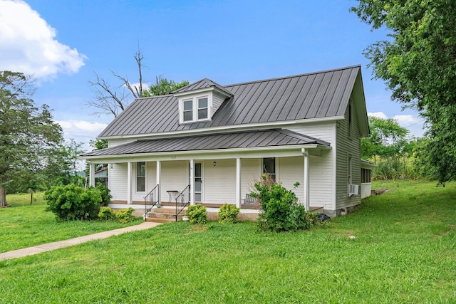1672 Globe Rd, Lewisburg, TN 37091 - view of front of house featuring a porch, a front lawn, metal roof, and cooling unit