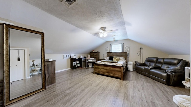 813 Chaney Woods Dr, La Vergne, TN 37086 - bedroom with light wood-style floors, baseboards, and vaulted ceiling