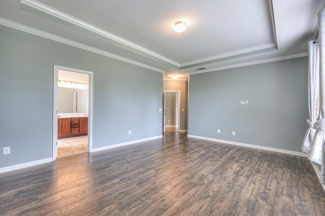 21 Cypress Hill Dr, Lebanon, TN 37087 - unfurnished room featuring a raised ceiling, dark wood finished floors, crown molding, and baseboards