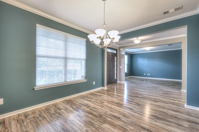 21 Cypress Hill Dr, Lebanon, TN 37087 - unfurnished room with baseboards, ornamental molding, a chandelier, and wood finished floors