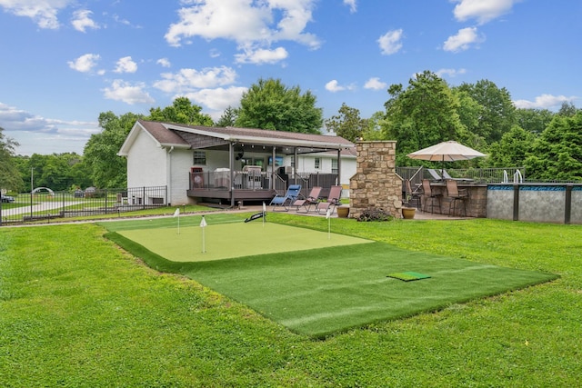 1006 Indian Trl, Castalian Springs, TN 37031 - rear view of property featuring an area to practice putting and a patio