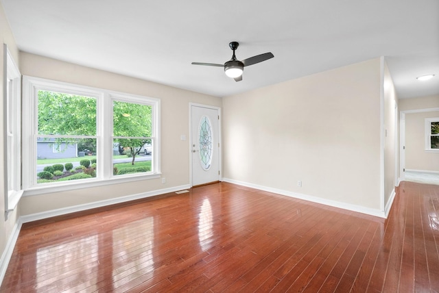 2505 Buckner Dr, Hopkinsville, KY 42240 - spare room with healthy amount of natural light, baseboards, and hardwood / wood-style flooring