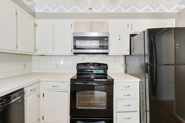 445 Belinda Pkwy, Mount Juliet, TN 37122 - kitchen featuring black appliances, tasteful backsplash, light countertops, and white cabinetry