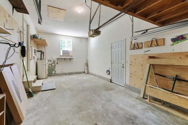 445 Belinda Pkwy, Mount Juliet, TN 37122 - garage with gas water heater, cooling unit, and a garage door opener