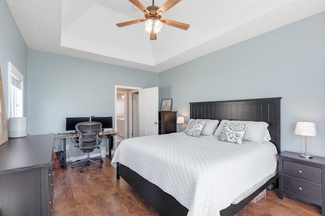 1300 Wentworth Dr, Gallatin, TN 37066 - bedroom with a tray ceiling, wood finished floors, an office area, and ceiling fan