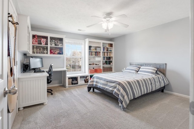 1300 Wentworth Dr, Gallatin, TN 37066 - bedroom featuring light carpet, an office area, baseboards, a ceiling fan, and radiator heating unit