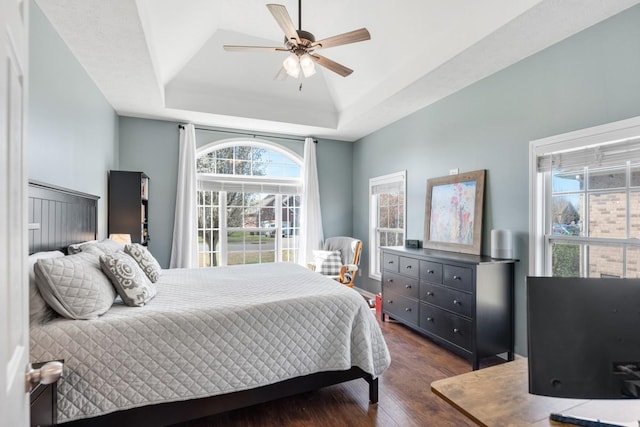 1300 Wentworth Dr, Gallatin, TN 37066 - bedroom featuring a tray ceiling, dark wood-type flooring, and ceiling fan