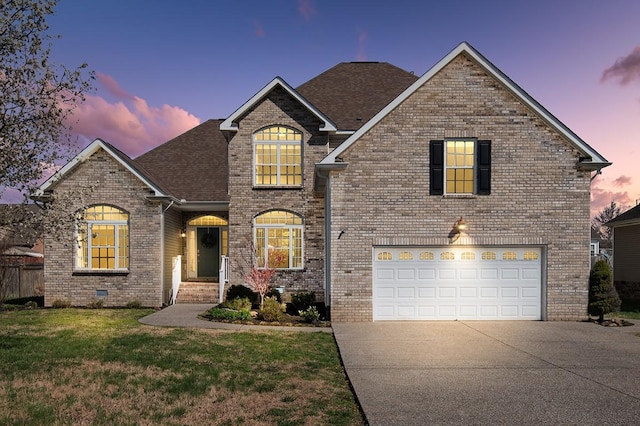 1300 Wentworth Dr, Gallatin, TN 37066 - view of front of property featuring driveway, brick siding, a garage, and a shingled roof