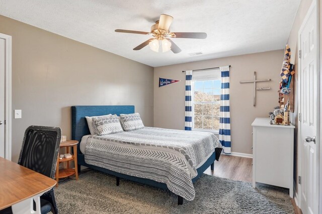 1300 Wentworth Dr, Gallatin, TN 37066 - bedroom with wood finished floors, a ceiling fan, and baseboards