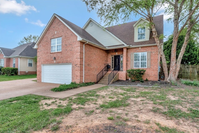 1838 Oreilly Cir, Spring Hill, TN 37174 - traditional-style house with brick siding, an attached garage, concrete driveway, and roof with shingles