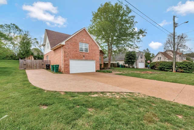 1838 Oreilly Cir, Spring Hill, TN 37174 - view of side of home with brick siding, an attached garage, driveway, and a gate