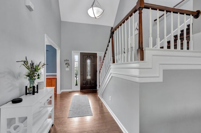 1838 Oreilly Cir, Spring Hill, TN 37174 - entrance foyer featuring a high ceiling, stairs, wood finished floors, and baseboards