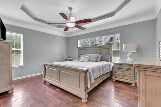 1838 Oreilly Cir, Spring Hill, TN 37174 - bedroom with a tray ceiling, dark wood finished floors, baseboards, ceiling fan, and ornamental molding