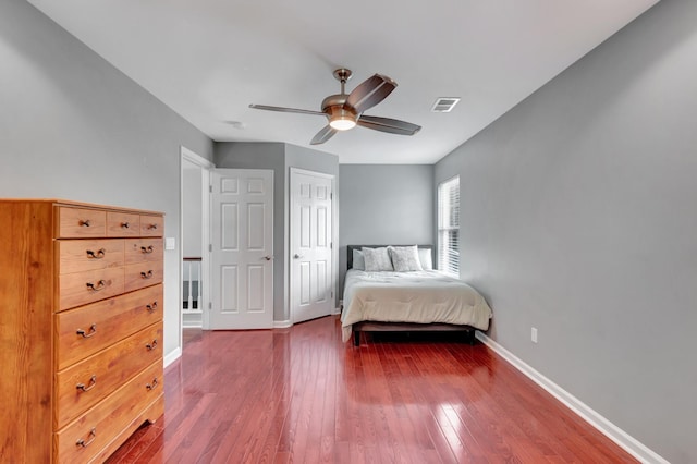 1838 Oreilly Cir, Spring Hill, TN 37174 - bedroom featuring dark wood finished floors, baseboards, a ceiling fan, and a closet