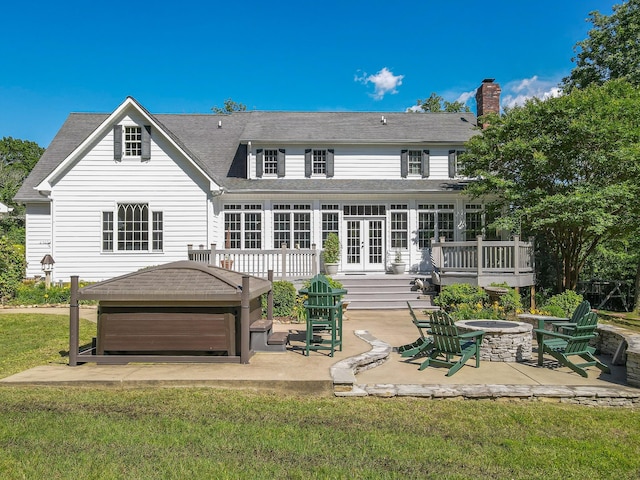 15687 Columbia Hwy, Lynnville, TN 38472 - rear view of house featuring an outdoor fire pit, a patio, a wooden deck, and french doors