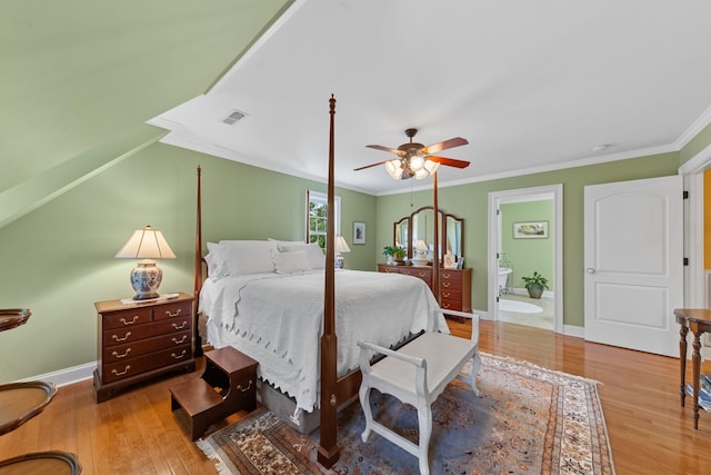 15687 Columbia Hwy, Lynnville, TN 38472 - bedroom with wood finished floors, crown molding, ensuite bathroom, a ceiling fan, and baseboards