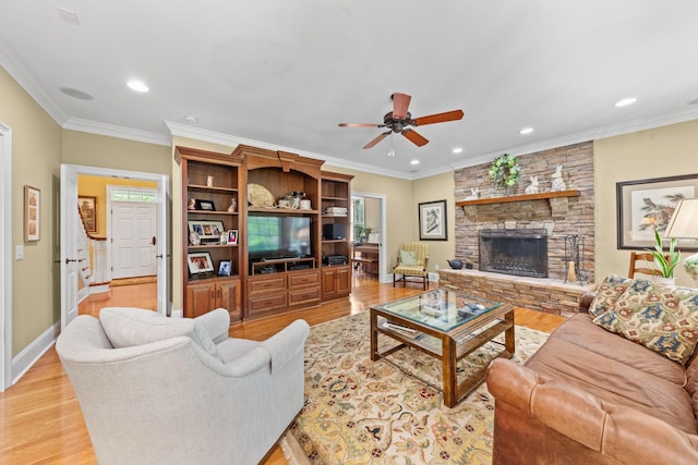 15687 Columbia Hwy, Lynnville, TN 38472 - living room with light wood-type flooring, recessed lighting, ceiling fan, a stone fireplace, and baseboards