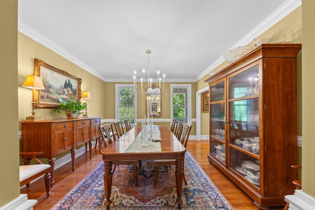 15687 Columbia Hwy, Lynnville, TN 38472 - dining space with a chandelier, light wood-style floors, and ornamental molding