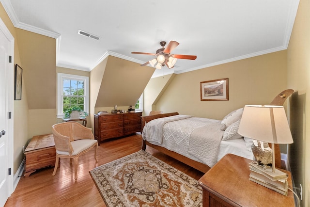 15687 Columbia Hwy, Lynnville, TN 38472 - bedroom featuring light wood finished floors, crown molding, a ceiling fan, and baseboards