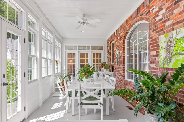 15687 Columbia Hwy, Lynnville, TN 38472 - sunroom featuring brick wall, ceiling fan, french doors, and outdoor dining area