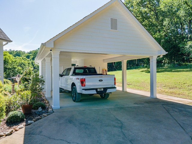 15687 Columbia Hwy, Lynnville, TN 38472 - view of parking / parking lot with concrete driveway and a carport