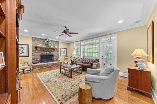15687 Columbia Hwy, Lynnville, TN 38472 - living room with crown molding, light wood-style flooring, a fireplace, a ceiling fan, and recessed lighting