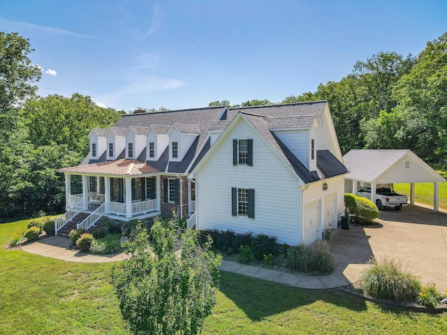 15687 Columbia Hwy, Lynnville, TN 38472 - cape cod house with a porch, a front lawn, a carport, concrete driveway, and a shingled roof
