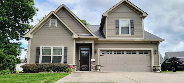 222 Pumphill Rd, Dickson, TN 37055 - craftsman house featuring concrete driveway, an attached garage, a front lawn, and a shingled roof