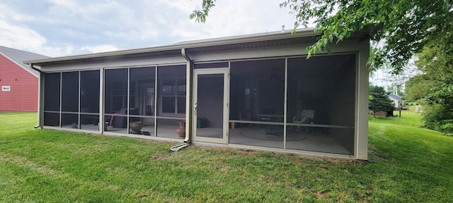 222 Pumphill Rd, Dickson, TN 37055 - rear view of property featuring a sunroom and a lawn