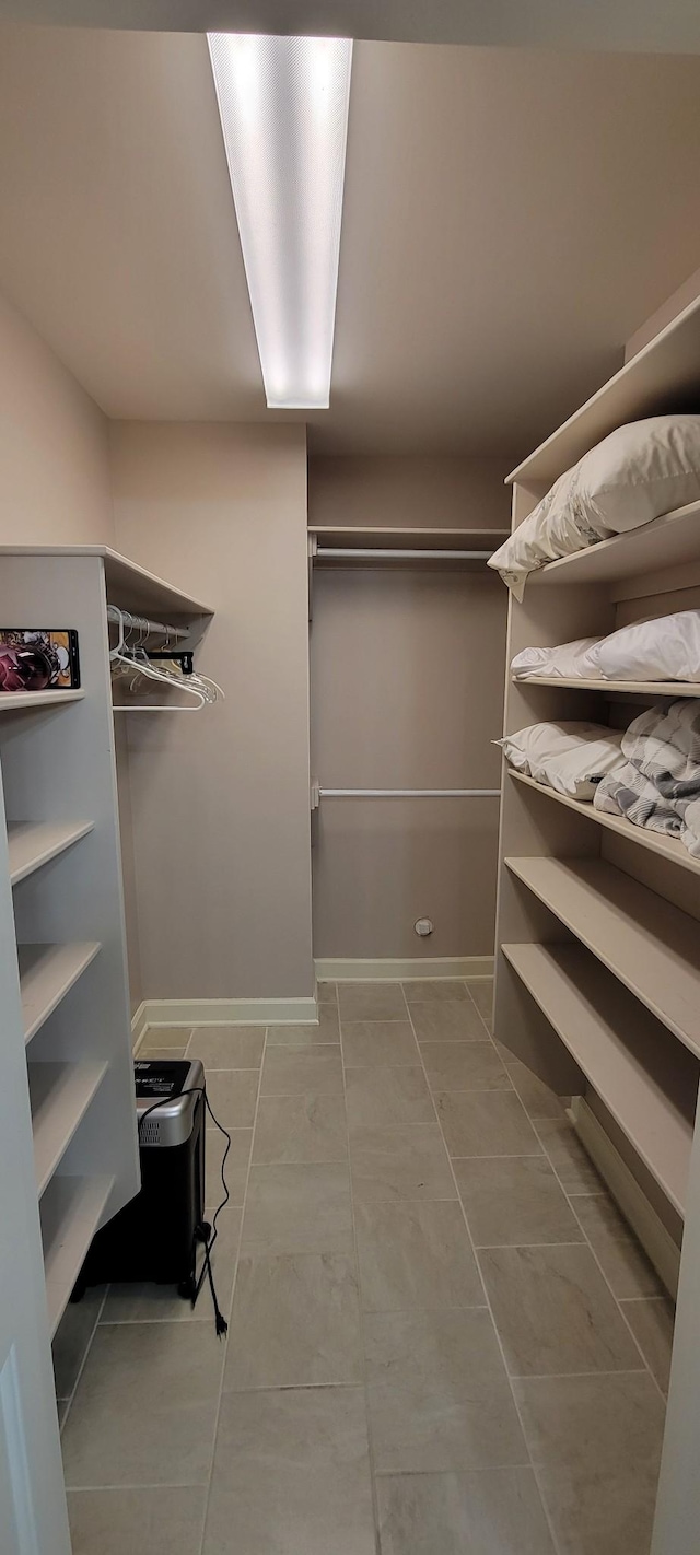 222 Pumphill Rd, Dickson, TN 37055 - spacious closet featuring tile patterned flooring