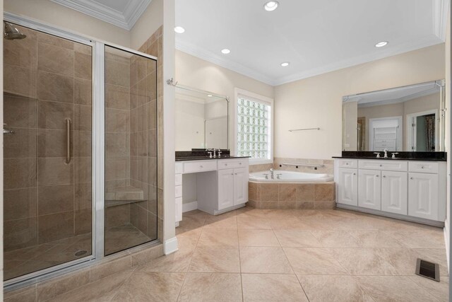 3037 Flagstone Dr, Franklin, TN 37069 - full bath featuring a stall shower, a garden tub, two vanities, ornamental molding, and recessed lighting