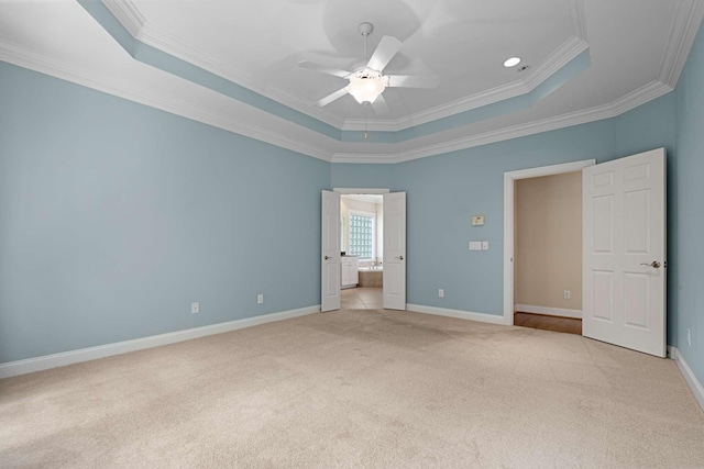 3037 Flagstone Dr, Franklin, TN 37069 - unfurnished bedroom with crown molding, a tray ceiling, light carpet, baseboards, and recessed lighting