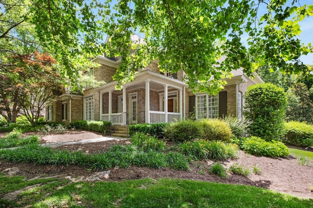 3037 Flagstone Dr, Franklin, TN 37069 - view of front of property with brick siding and a porch