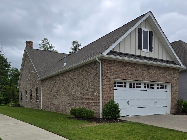 312 Buckner Cir, Mount Juliet, TN 37122 - view of side of home with board and batten siding, a chimney, concrete driveway, brick siding, and a lawn