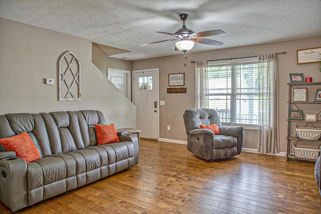 143 Rachelle Pl, Baxter, TN 38544 - living area featuring a ceiling fan, baseboards, hardwood / wood-style flooring, and a textured ceiling