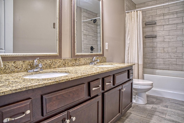 143 Rachelle Pl, Baxter, TN 38544 - bathroom with toilet, double vanity, shower / bath combo, and wood finished floors